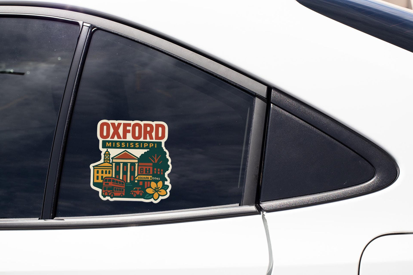 A car window with a sticker that says "Oxford Mississippi" on it.