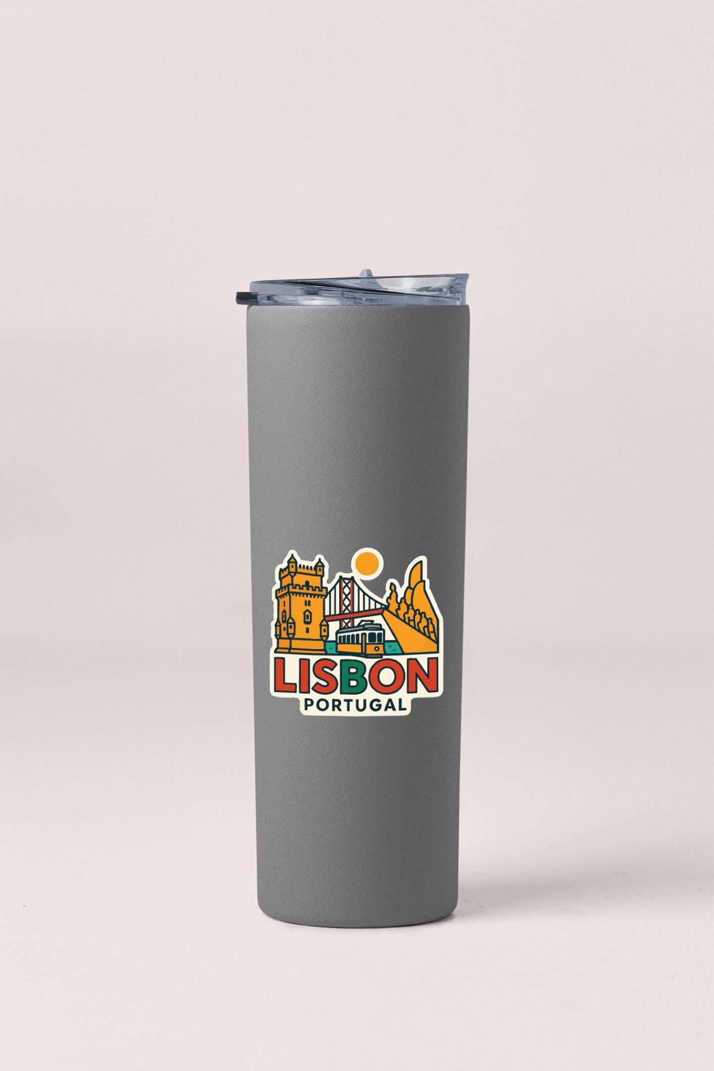 A gray insulated tumbler with a printed design of the city of Lisbon, Portugal, featuring landmarks and a sun.