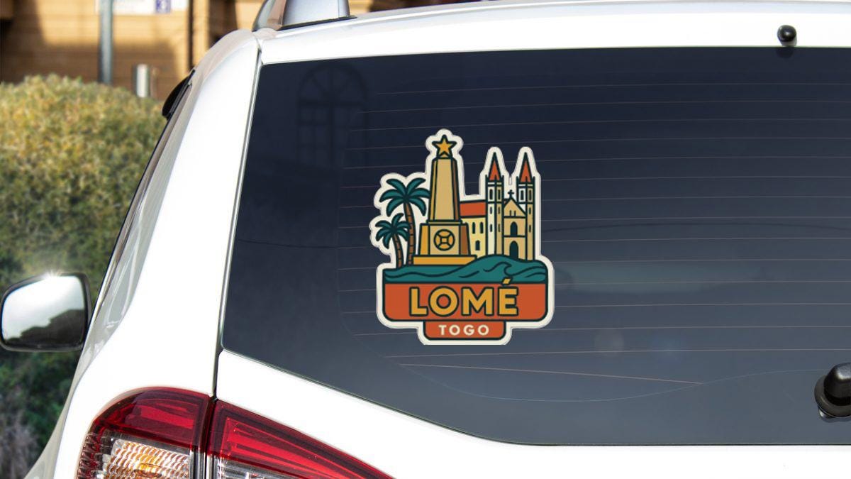 a sticker on the rear window of a car that says "LOME TOGO".