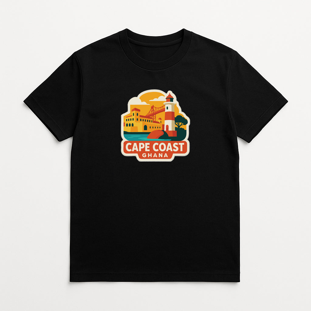 A black t-shirt with a graphic design depicting a lighthouse and a building, along with the text "CAPE COAST GHANA".