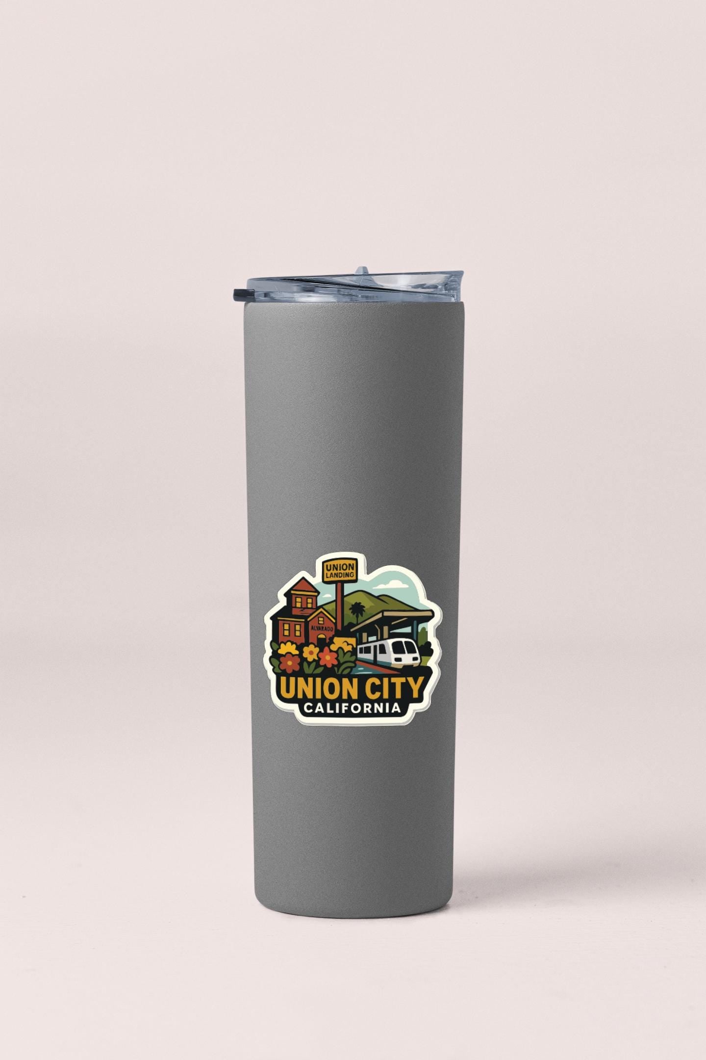 A gray insulated tumbler with a label that says "UNION CITY CALIFORNIA".