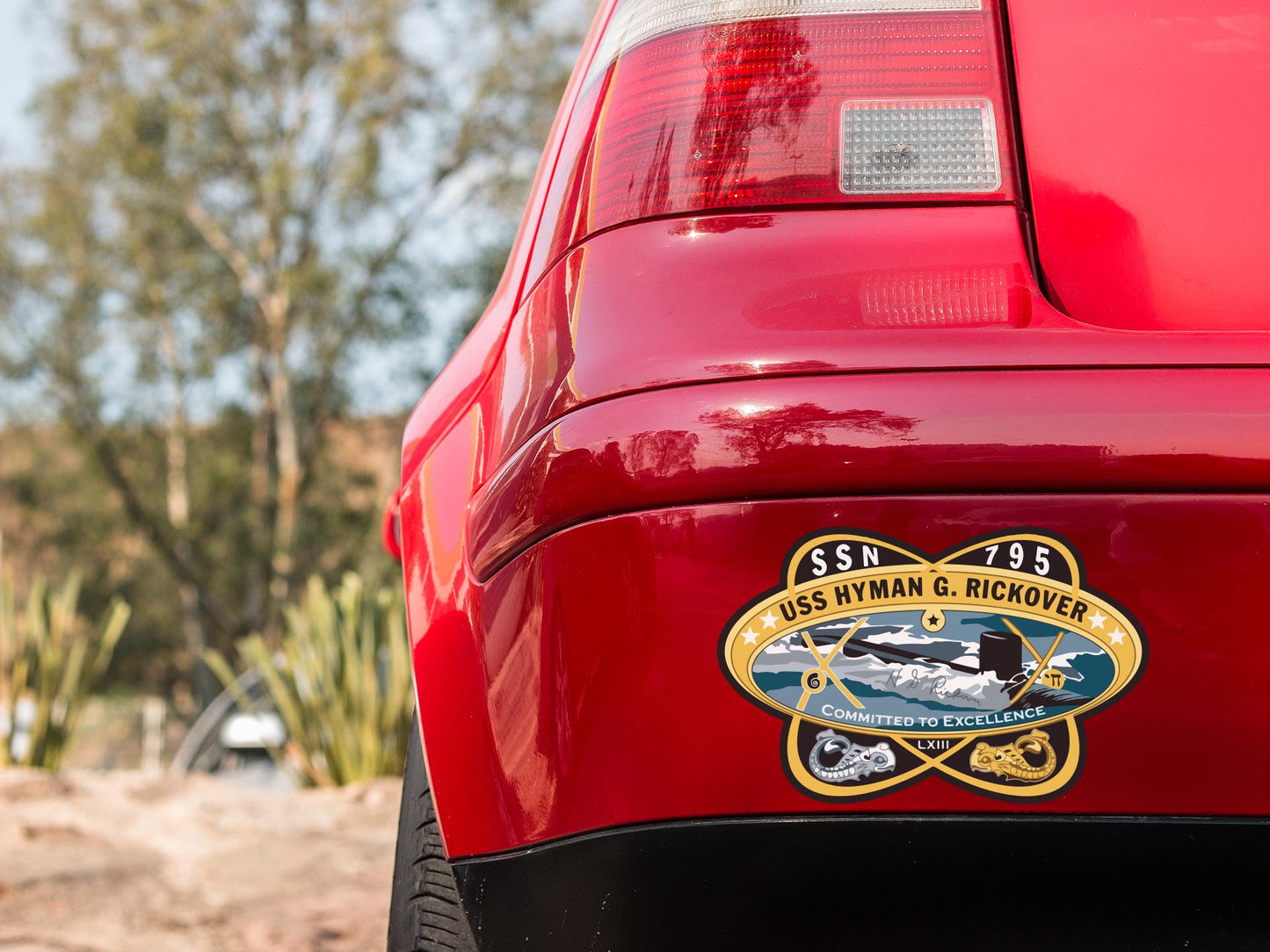 a close up of the rear end of a red car
