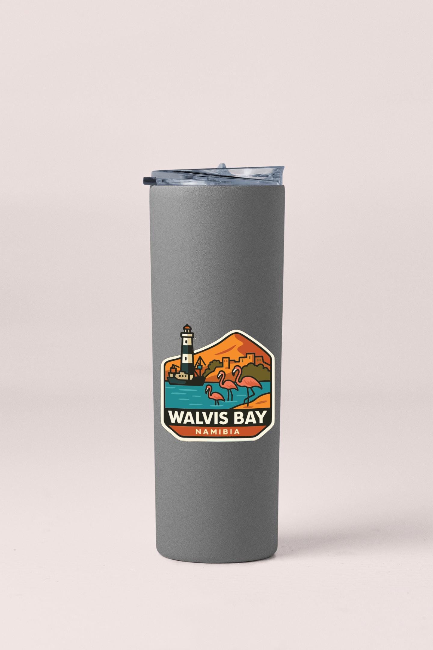 A gray insulated tumbler with a printed label that says "WALVIS BAY NAMIBIA".