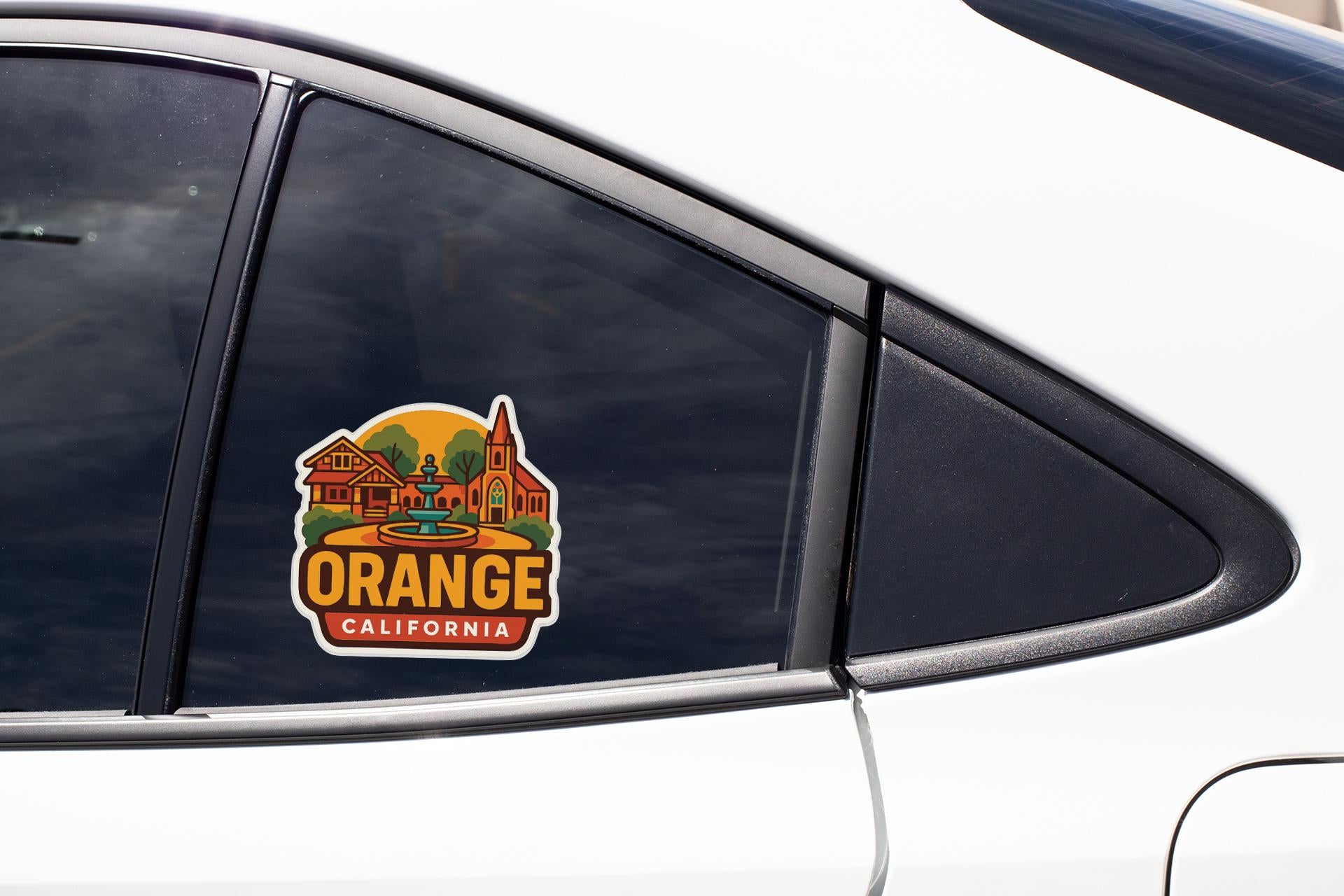 A sticker on the side of a car window that says "Orange California".