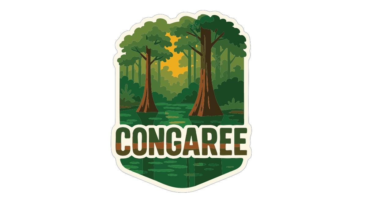 A sticker or emblem featuring a lush, green forest landscape with two tall trees and a body of water, along with the word "CONGAREE" prominently displayed.