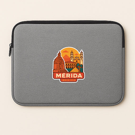 a gray laptop sleeve with a sticker of a city skyline and the word "MERIDA" printed on it.