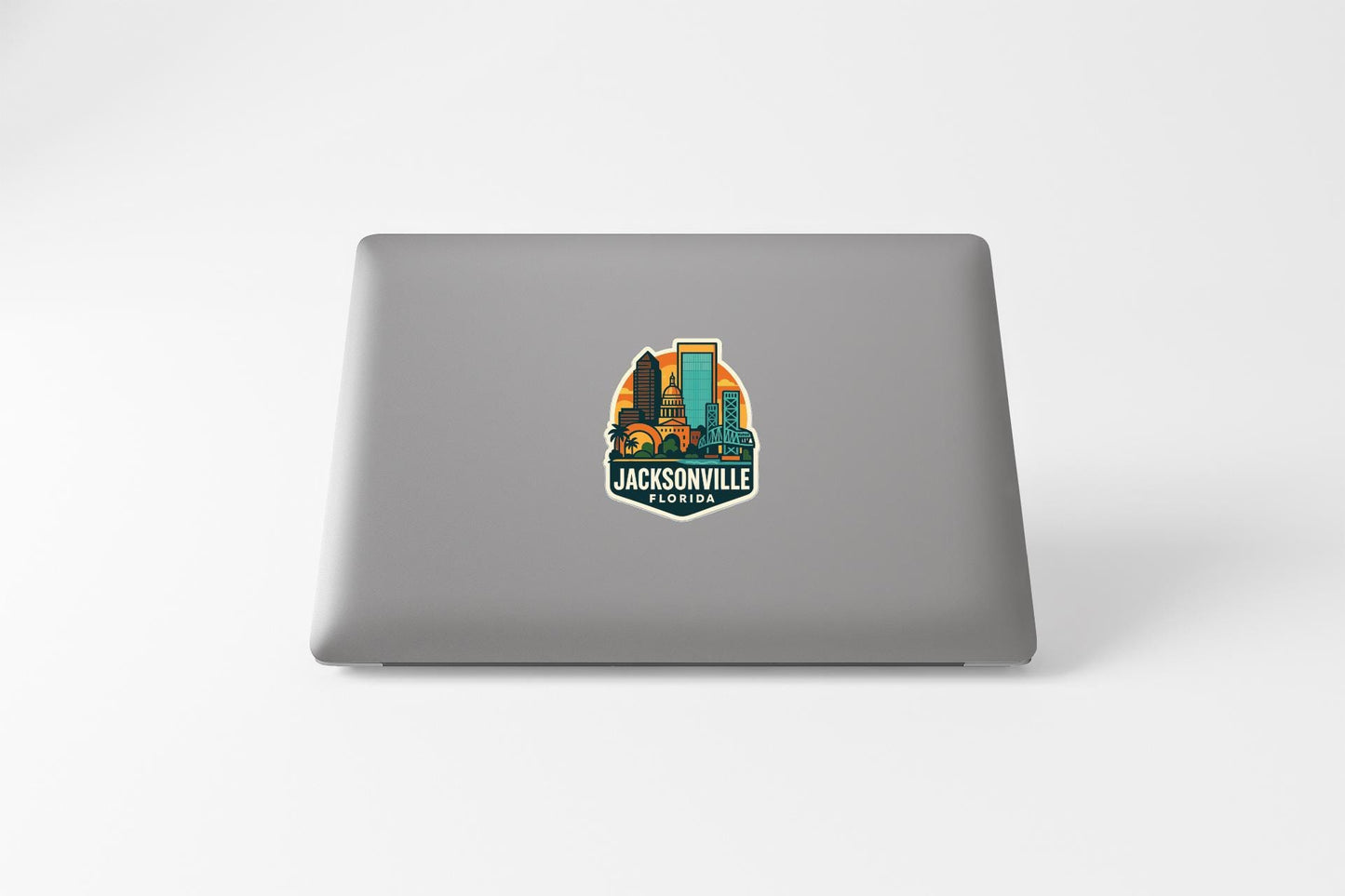 A sticker featuring a cityscape with buildings and a palm tree, along with the text "JACKSONVILLE, FLORIDA" printed on it.