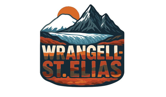 A stylized mountain landscape with a sun and clouds, along with the text "WRANGEL-ST. ELIAS" prominently displayed.