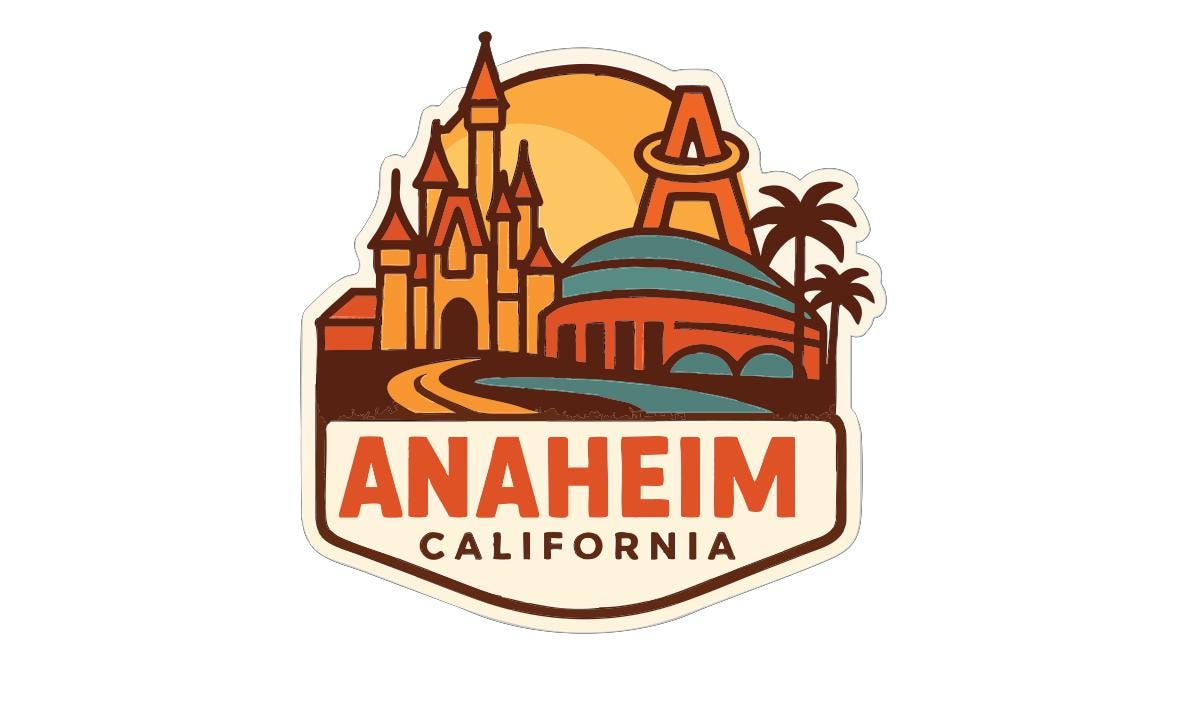 a sticker or emblem with a castle and palm trees, along with the text "ANAHEIM CALIFORNIA".
