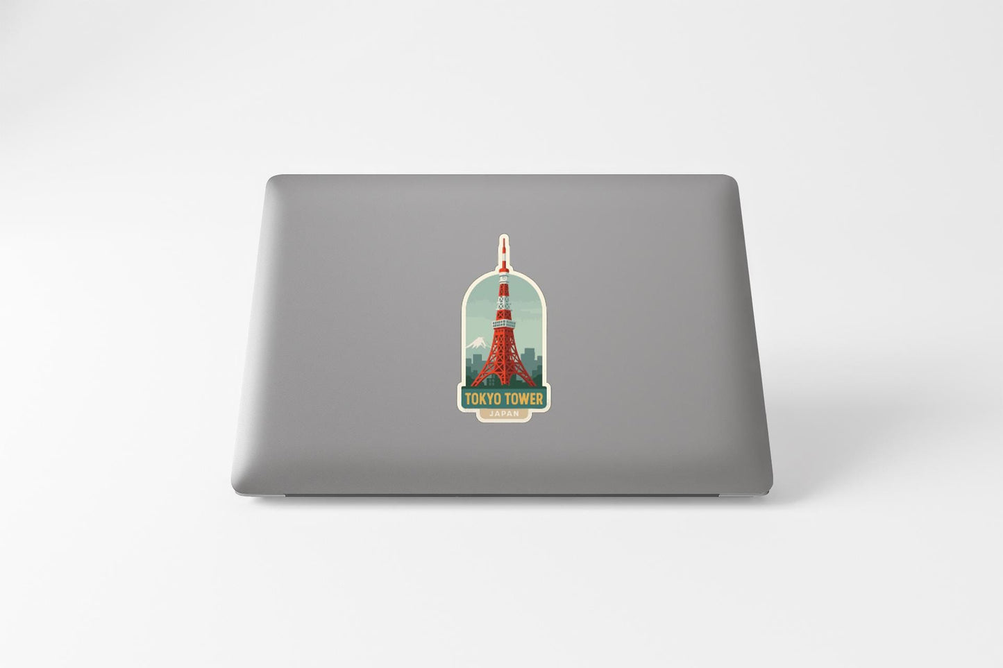 A sticker of the Tokyo Tower on a laptop computer.
