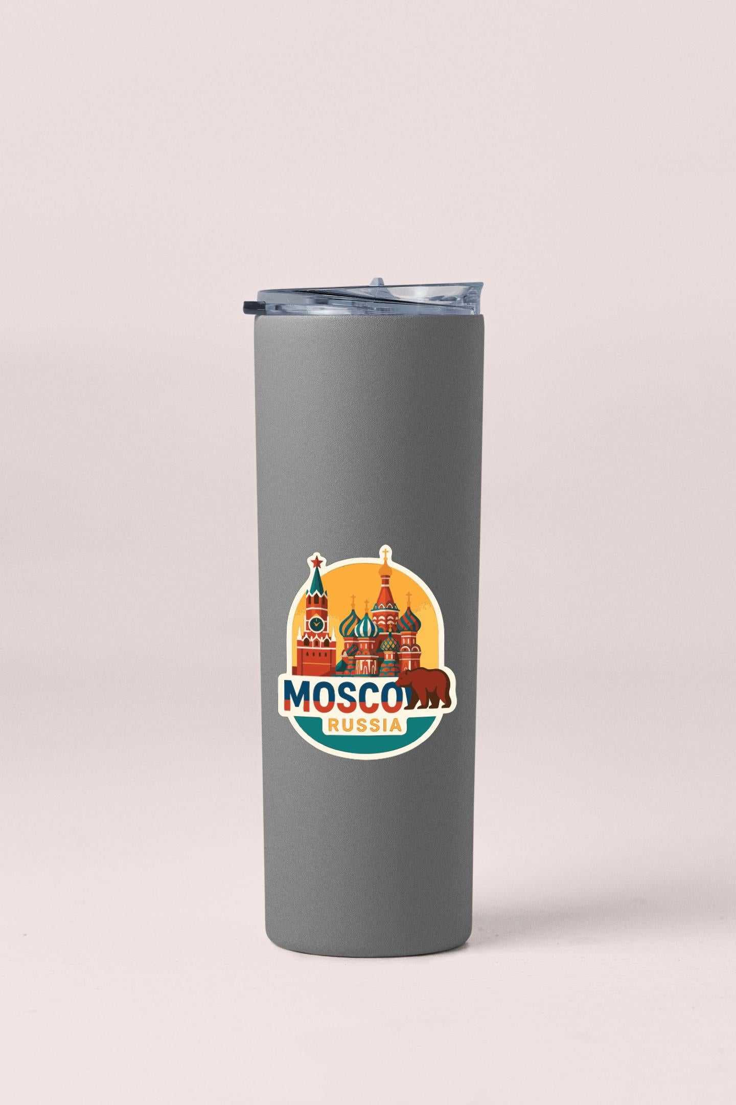 A gray tumbler with a sticker featuring the iconic St. Basil's Cathedral in Moscow, Russia.