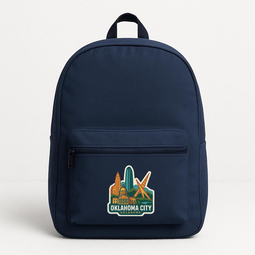 A navy blue backpack with a graphic of Oklahoma City on the front.