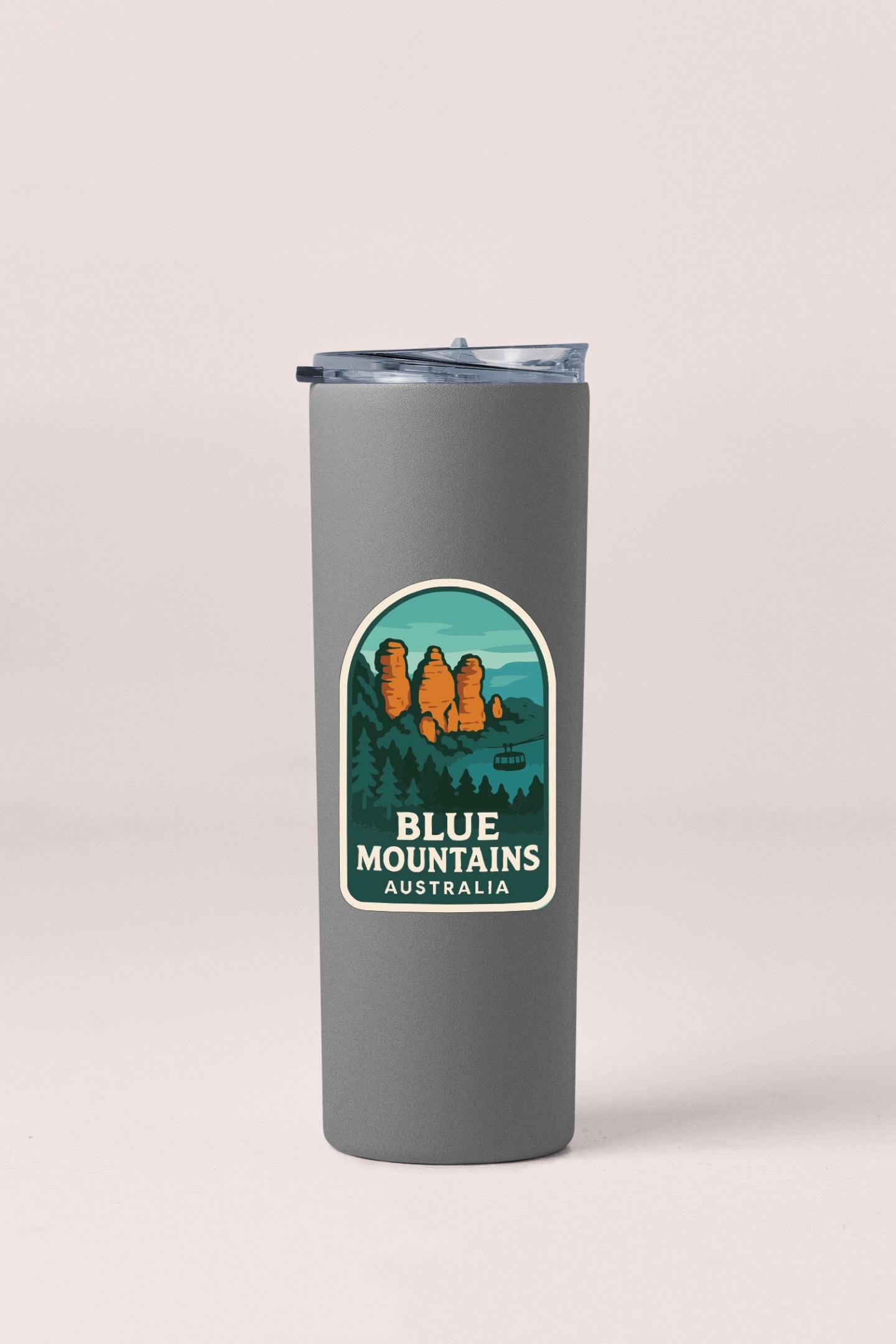 A gray insulated tumbler with a label that says "BLUE MOUNTAINS AUSTRALIA".