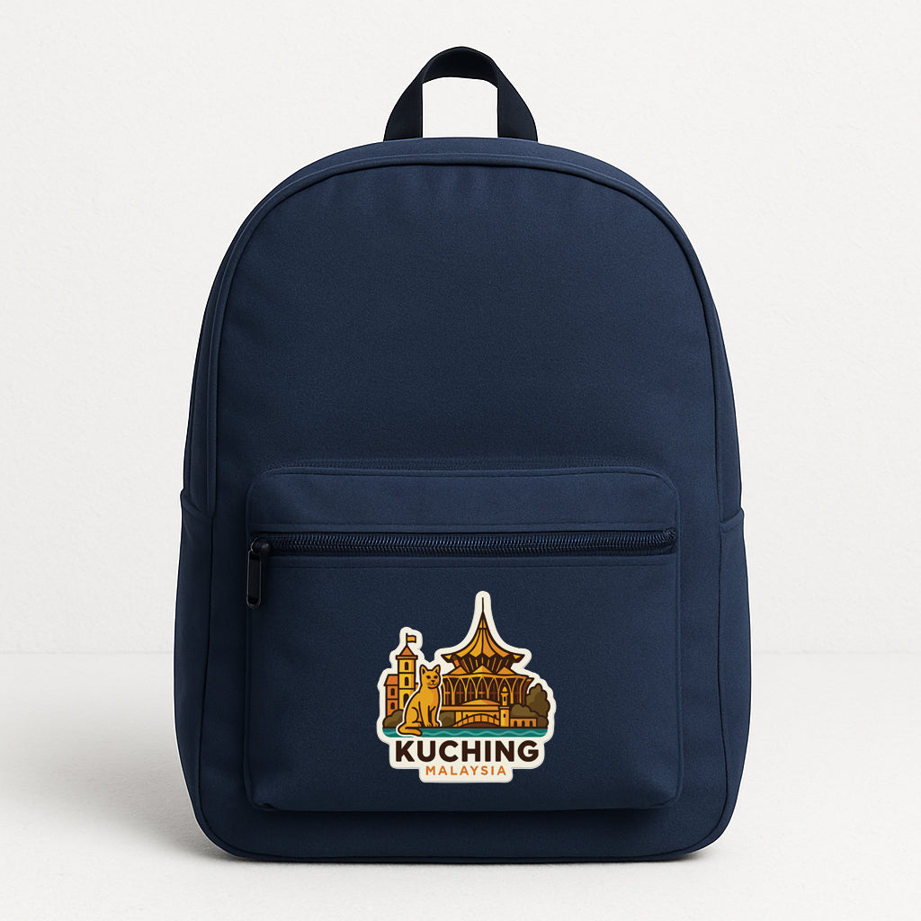 A navy blue backpack with a sticker on the front that says "Kuching Malaysia".
