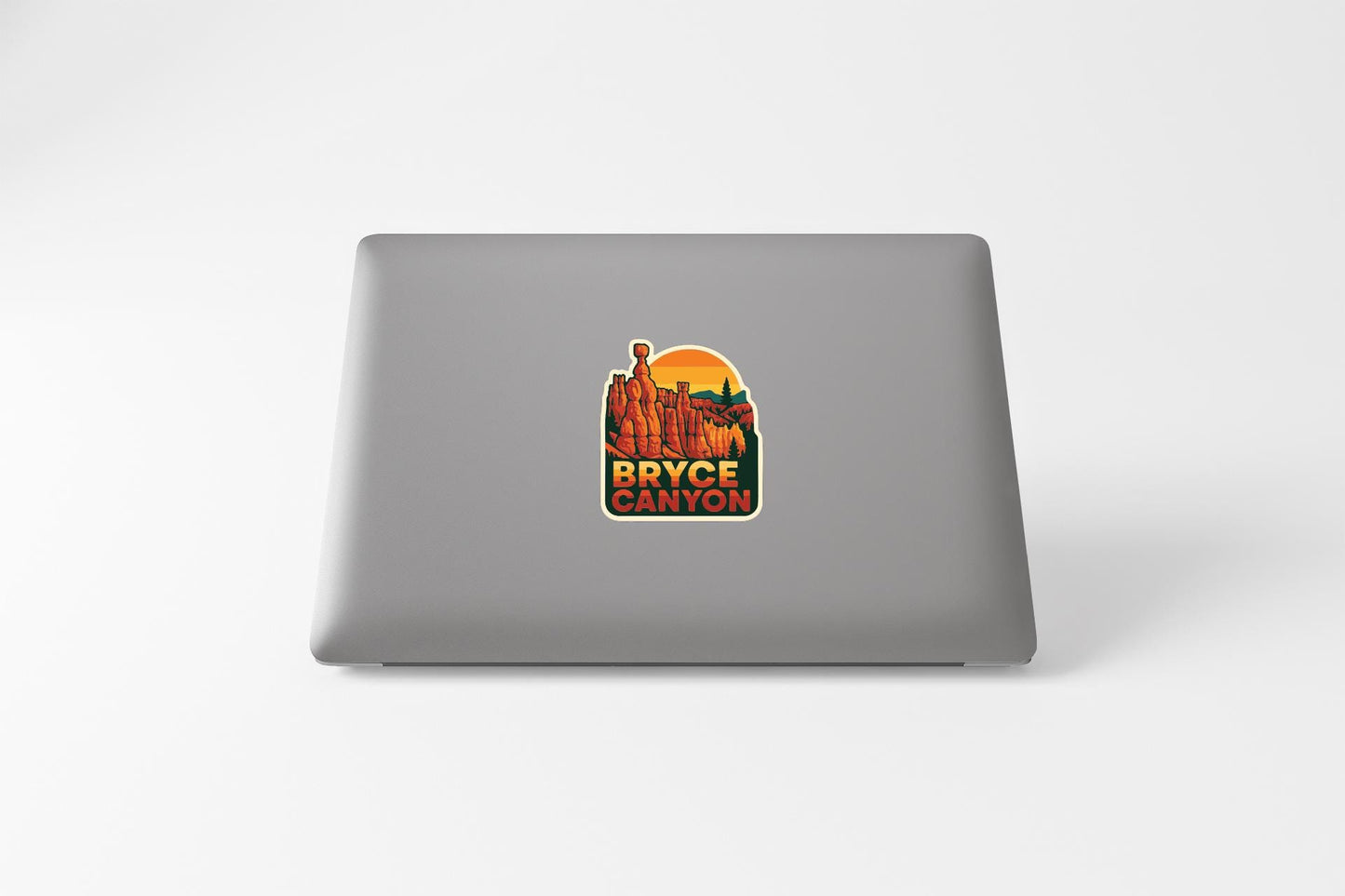 A sticker on the back of a laptop that says "Bryce Canyon".