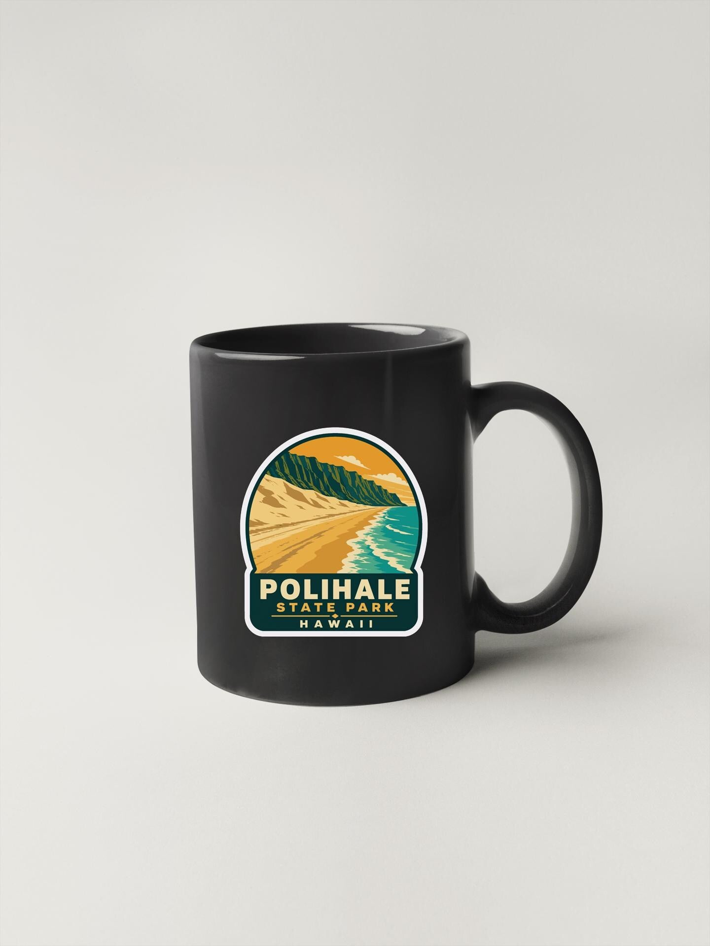 A black coffee mug with a sticker depicting a beach and ocean landscape, along with the text "POLIHALE STATE PARK, HAWAII".