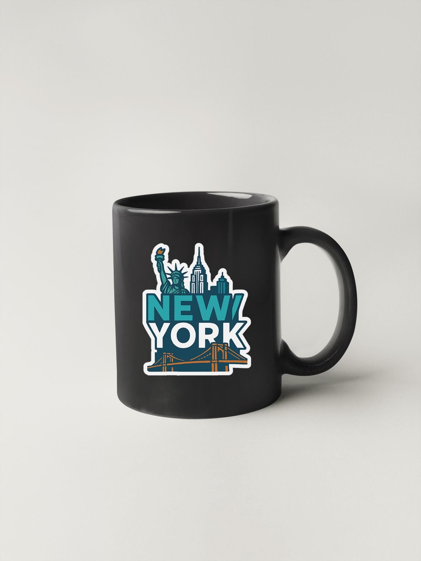 a black coffee mug with new york on it