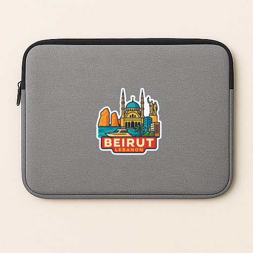 a gray laptop sleeve with a sticker of the city of Beirut, Lebanon.