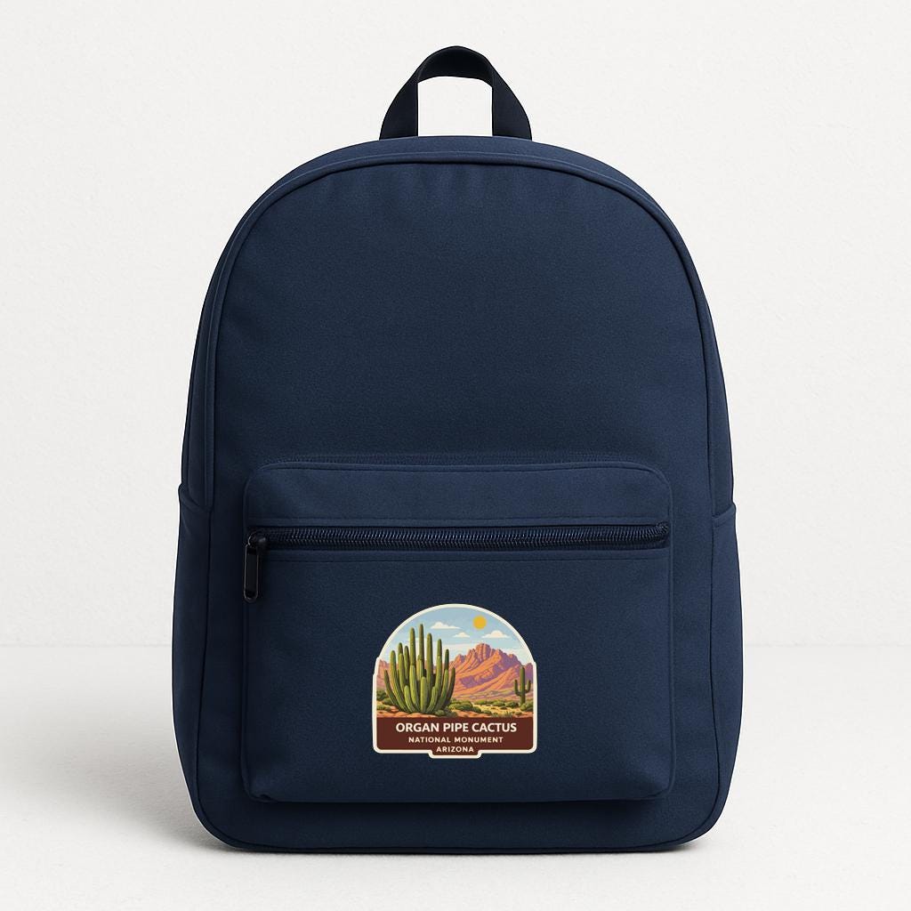 A navy blue backpack with a label that says "ORGAN PIPE CACTUS NATIONAL PARK" on the front pocket.