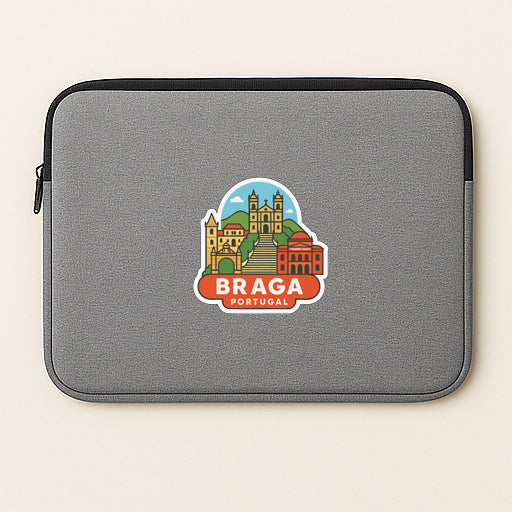 A gray laptop sleeve with a sticker depicting the city of Braga, Portugal.