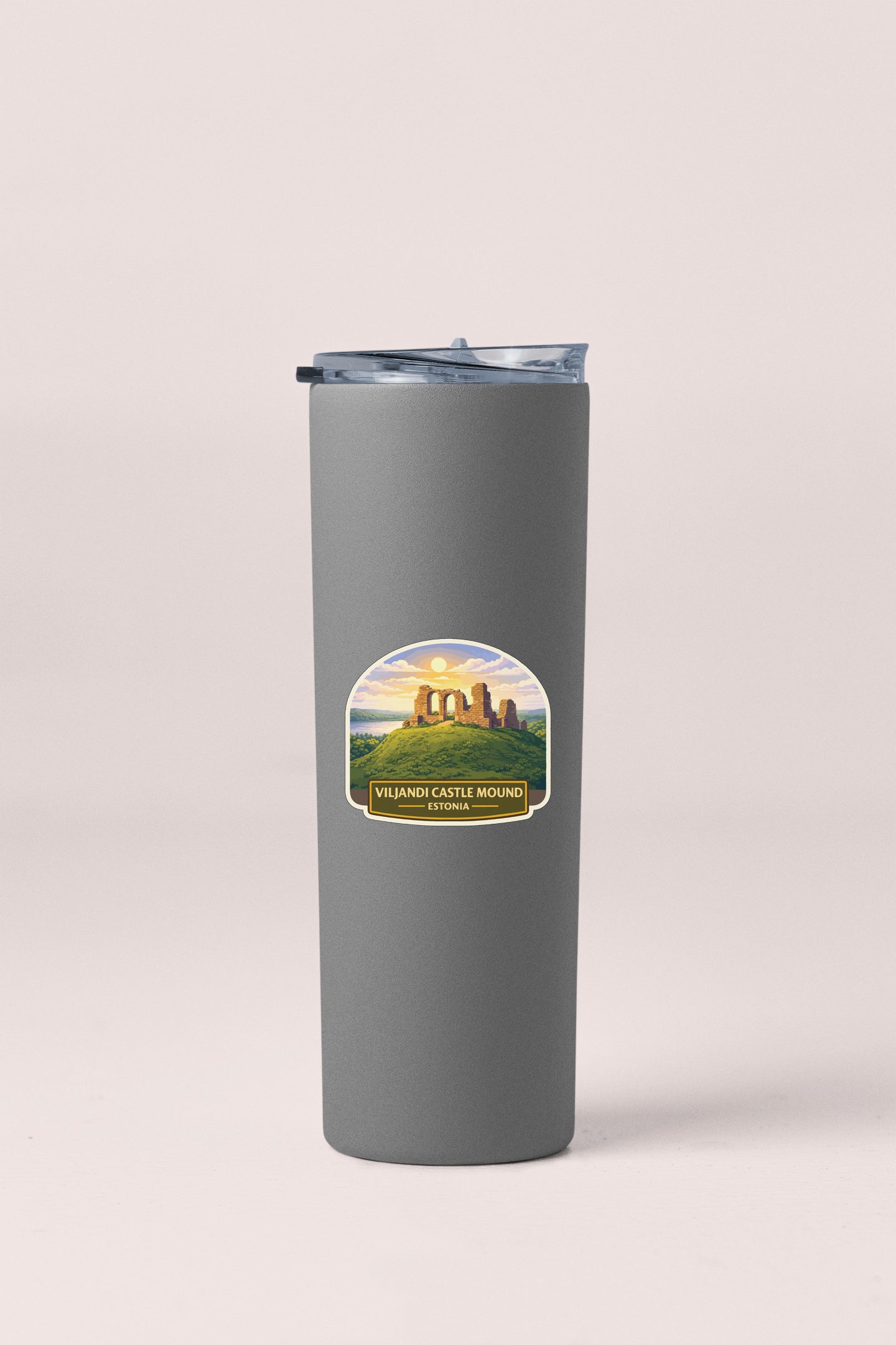 A gray insulated tumbler with a label that says "Vilani Castle Mound" and "ESTONIA" printed on it.