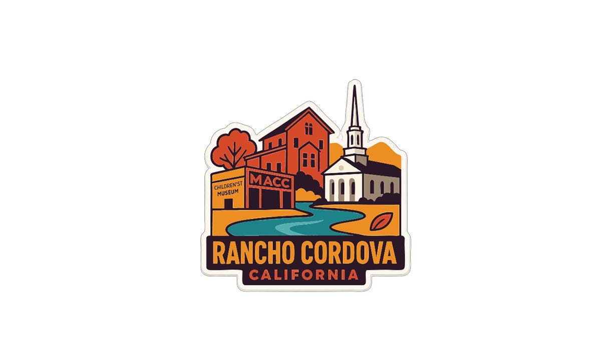 The image is a sticker or emblem featuring a stylized illustration of a town or city, with buildings, a church, and a river or stream. The text "RANCHO CORDOVA CALIFORNIA" is prominently displayed, indicating the location of the depicted town or city.