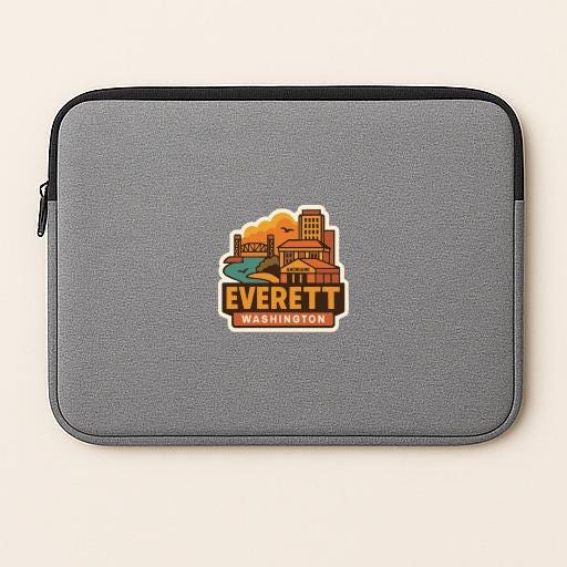 a gray laptop sleeve with a sticker of Everett, Washington, printed on it.