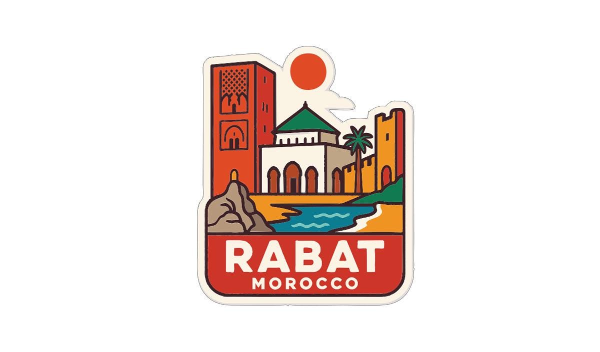 a sticker or emblem with a stylized illustration of a cityscape, including a tall building, a palm tree, and a body of water. The text "RABAT MOROCCO" is prominently displayed in the center of the image.