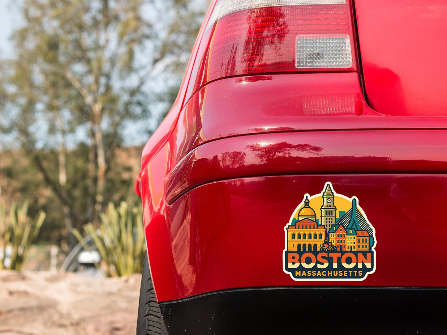 a red car with a sticker on it