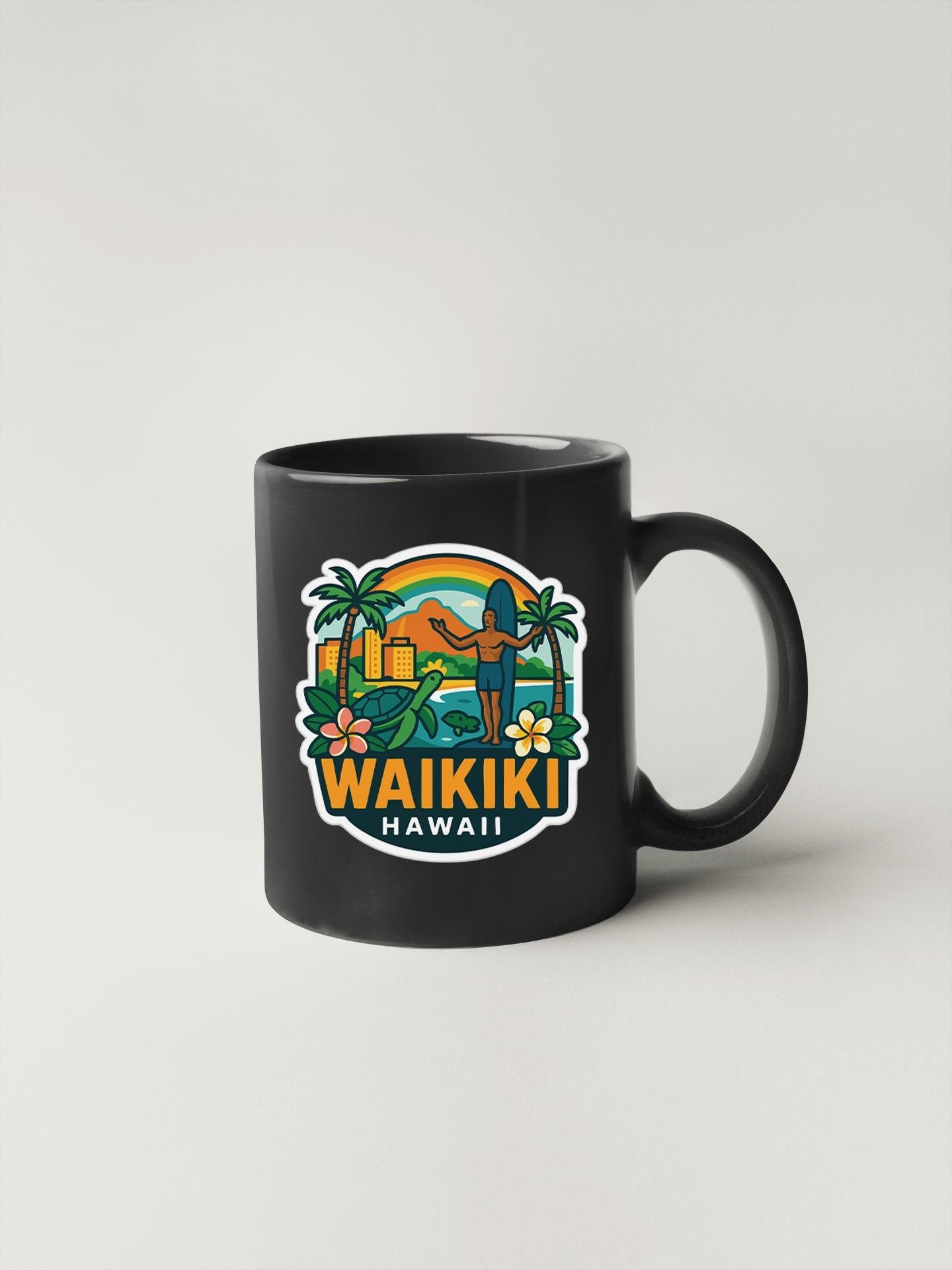 a black coffee mug with a picture of waiki on it