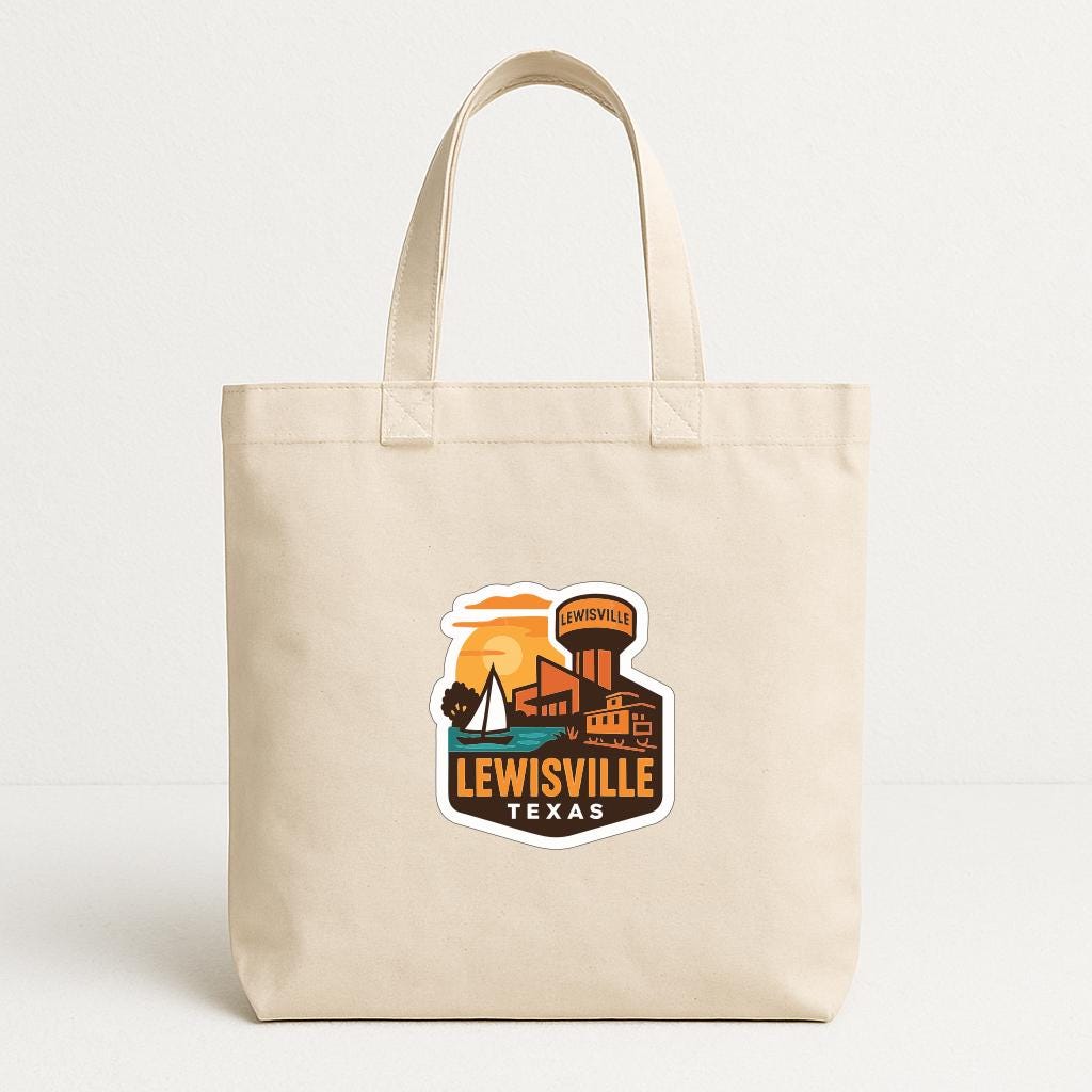 A beige tote bag with a printed design featuring a cityscape and the text "LEWISVILLE TEXAS".