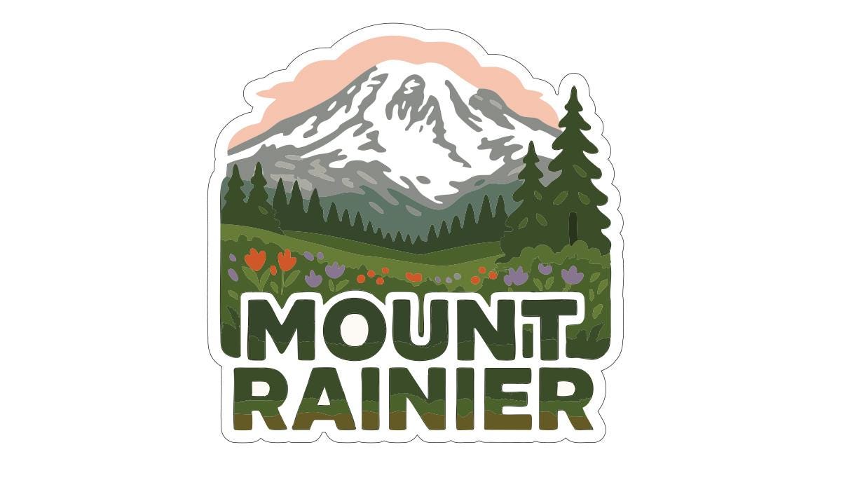 A sticker depicting a mountain landscape with a pine tree, flowers, and the text "MOUNT RAINIER" in a stylized font.
