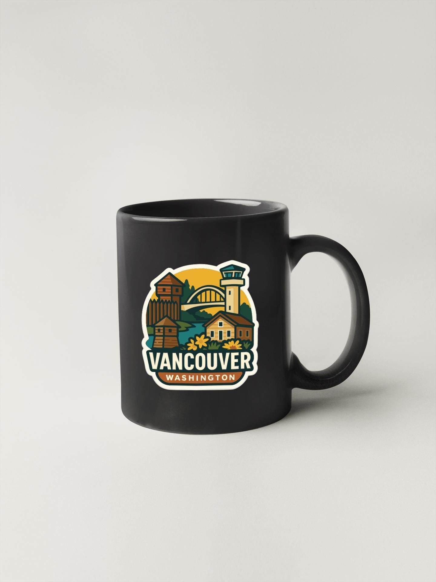 A black coffee mug with a graphic design depicting the city of Vancouver, Washington.