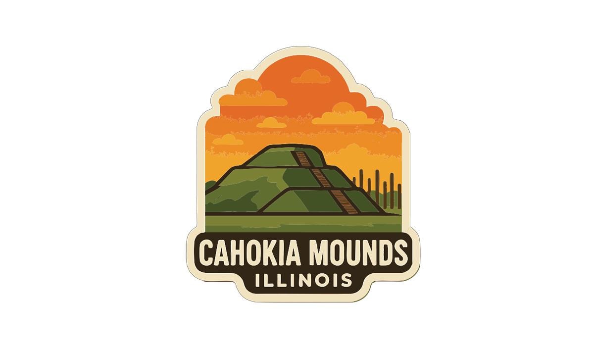 a sticker or emblem with a mountain landscape and a cloudy sky. The text below the image reads "CAHOKIA MOUNDS ILLINOIS".