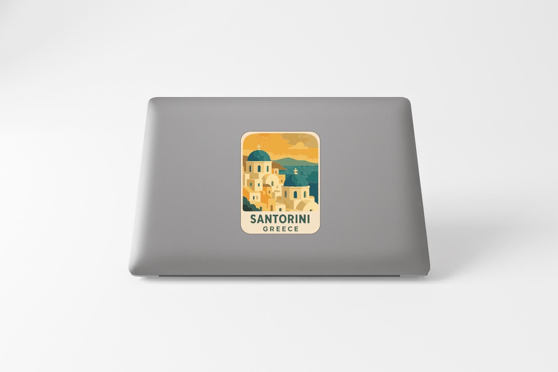 a sticker of Santorini, Greece, which is a popular tourist destination in Greece.