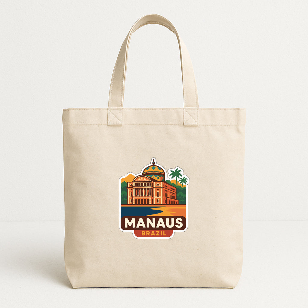 A beige tote bag with a printed design depicting the Manaus, Brazil, featuring a building with a dome and palm trees.
