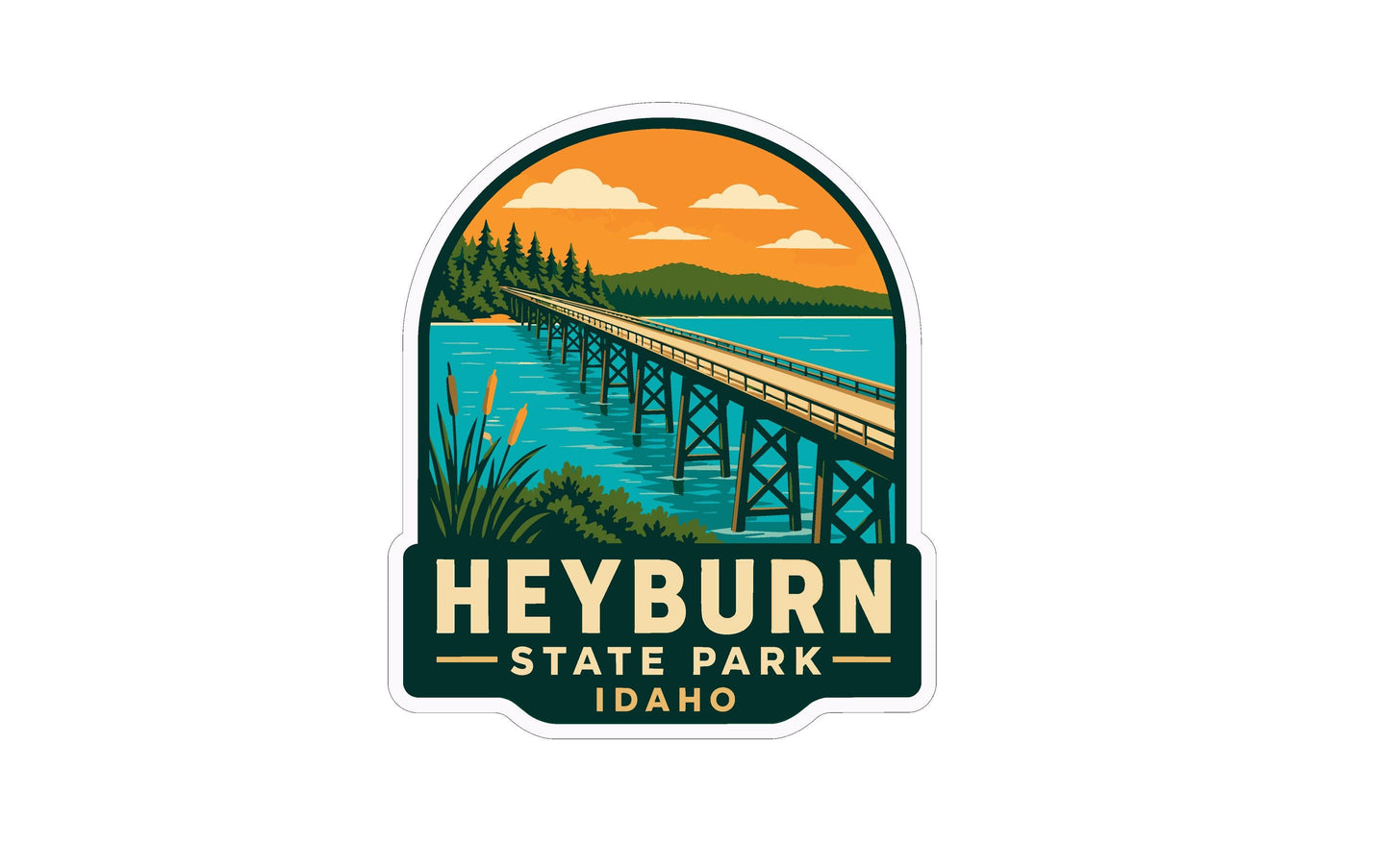 A sticker or emblem featuring a scenic landscape with a bridge, water, and mountains in the background, along with the text "Heyburn State Park, Idaho" prominently displayed.