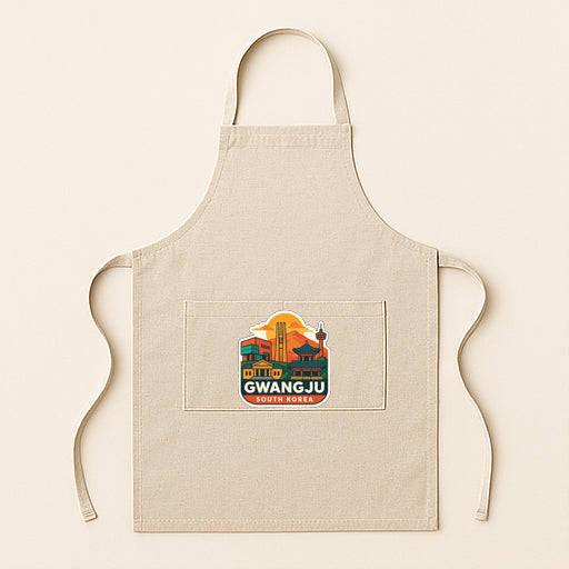 A beige apricot with a graphic design featuring a city skyline and the text " Gwang Ju South Korea" printed on it.