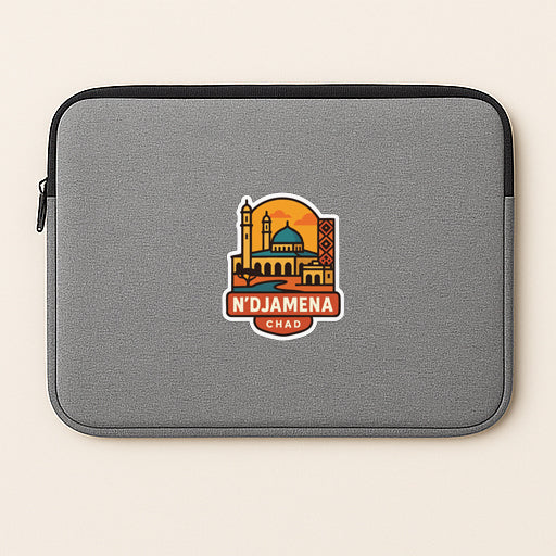 a gray laptop sleeve with a colorful sticker on it, depicting a city skyline with a mosque in the background.
