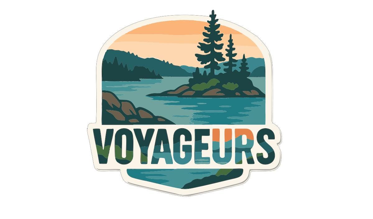 A sticker or logo featuring a scenic landscape with pine trees, a lake, and mountains in the background, along with the text "VOYAGEURS" prominently displayed.