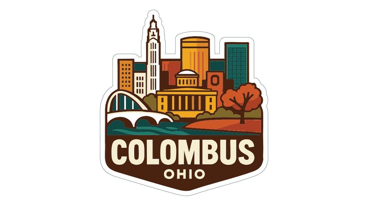 A sticker or emblem featuring the skyline of Columbus, Ohio, with various buildings and landmarks depicted in a stylized manner.