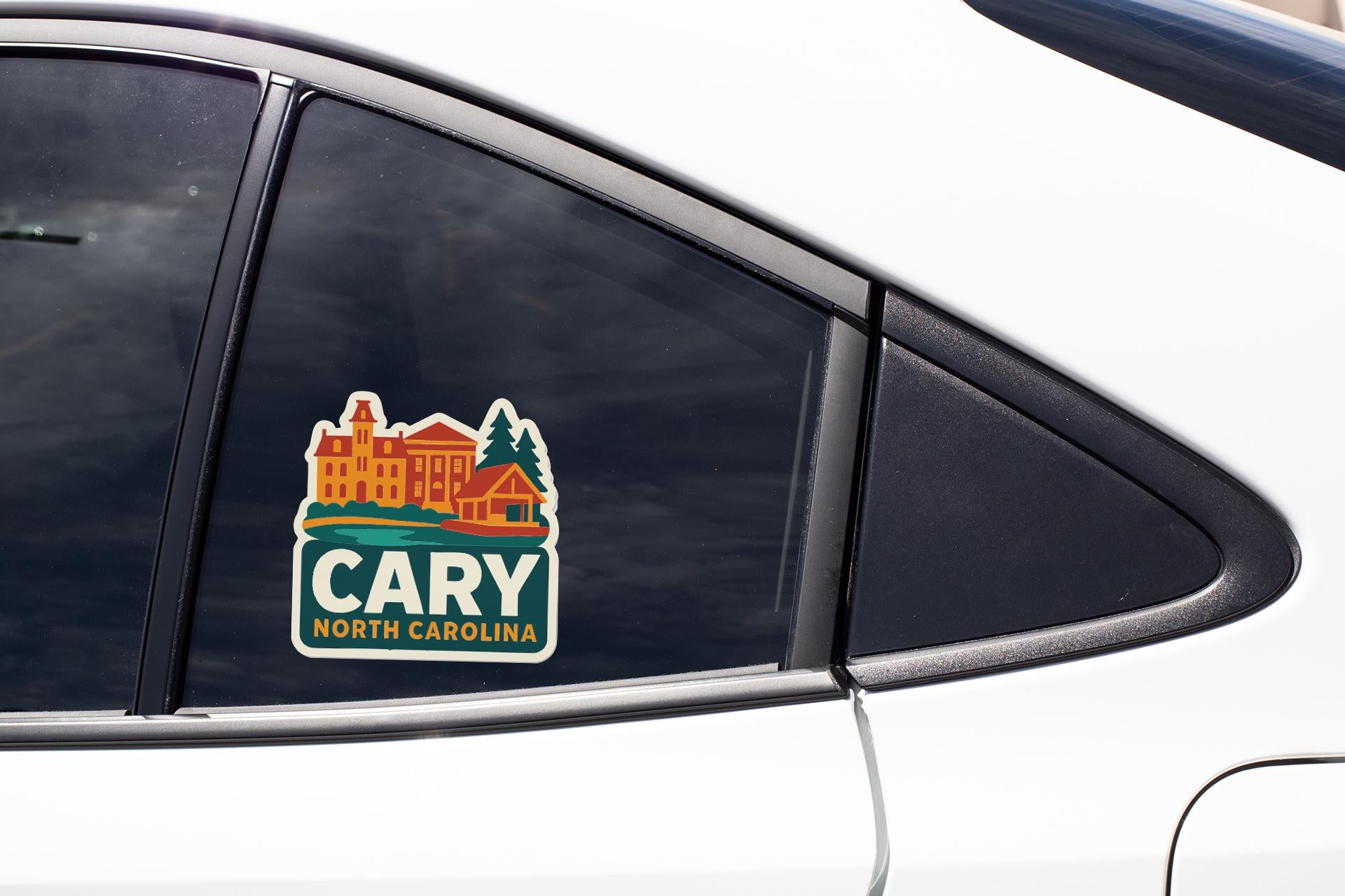 A sticker on the side of a car window that says "CARY NORTH CAROLINA".