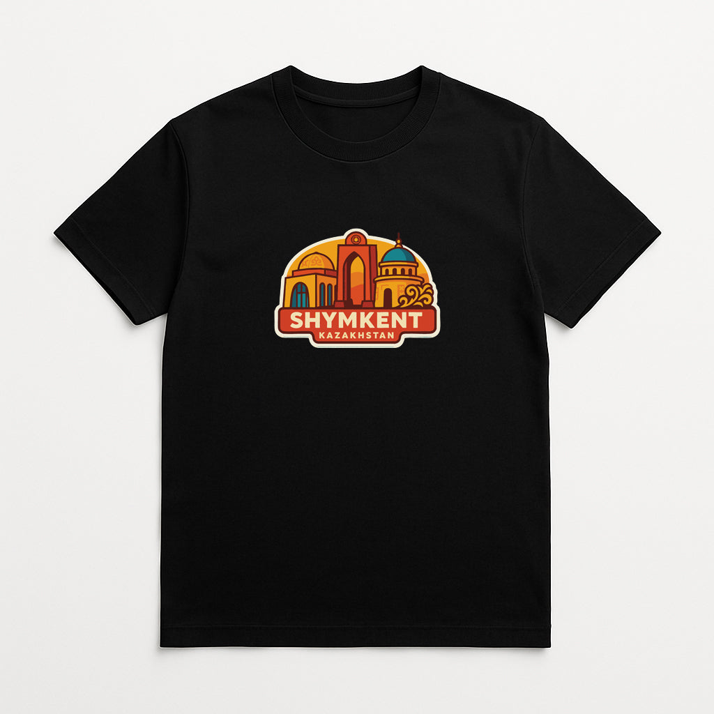 A black t-shirt with a graphic design featuring a colorful illustration of a city skyline and the text "SHYMKENT KAZAKHSTAN" printed on it.