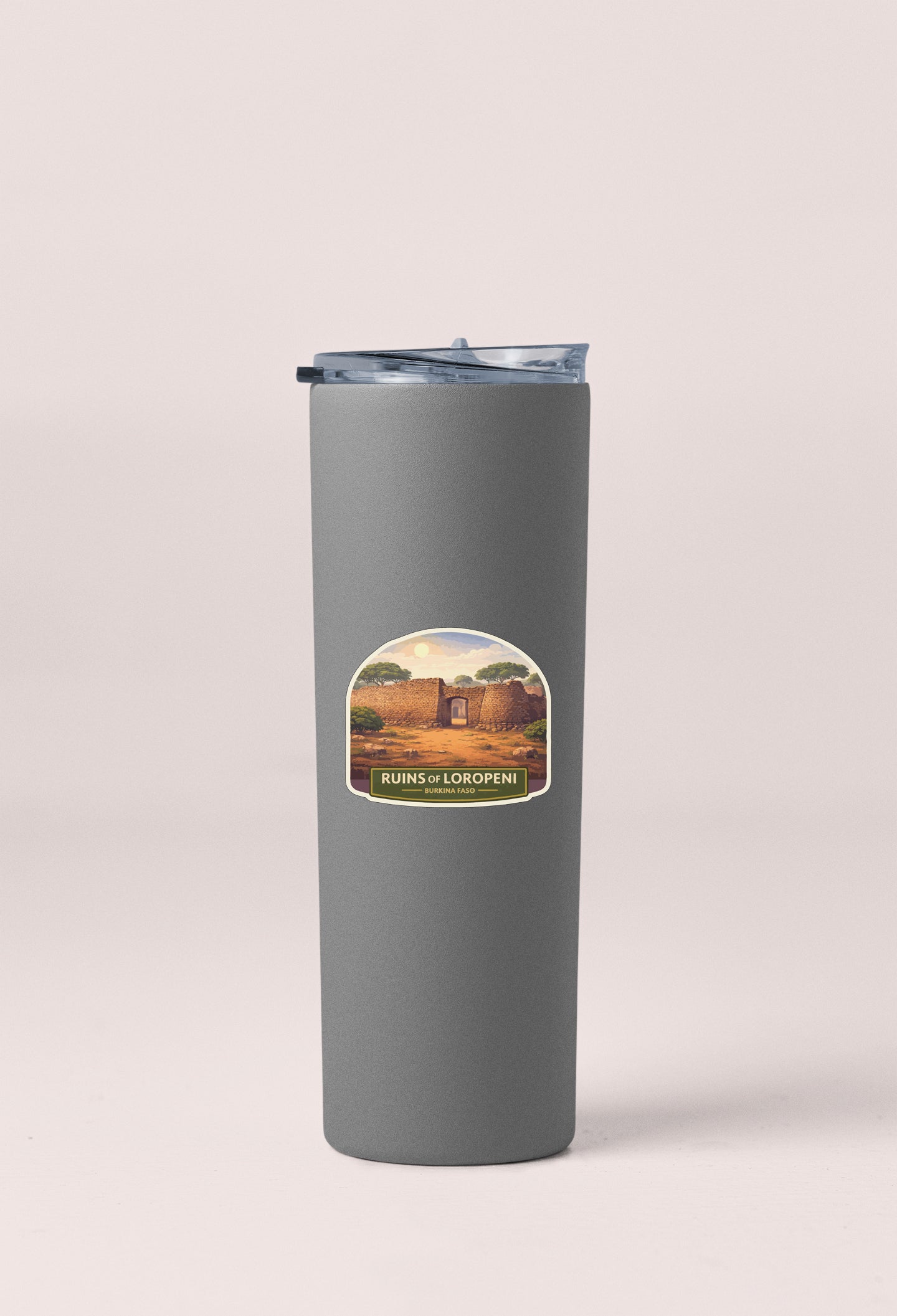 A gray cylindrical thermos with a label featuring an illustration of ruins and the text "RUINS OF LOROPENI".