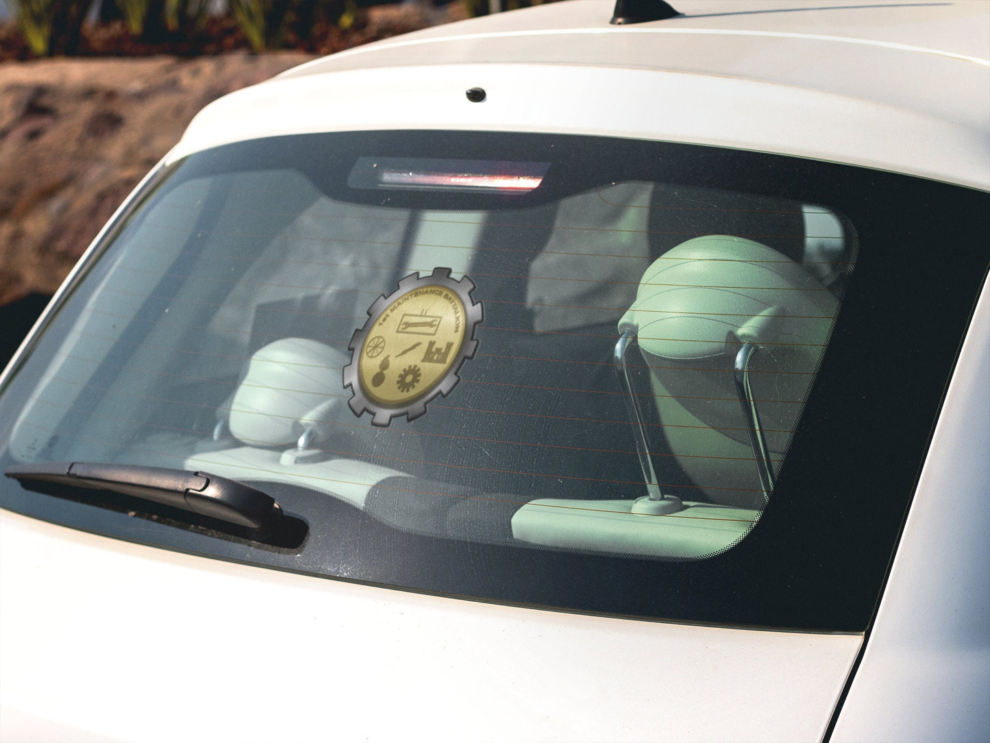 a white car with a clock on the front window