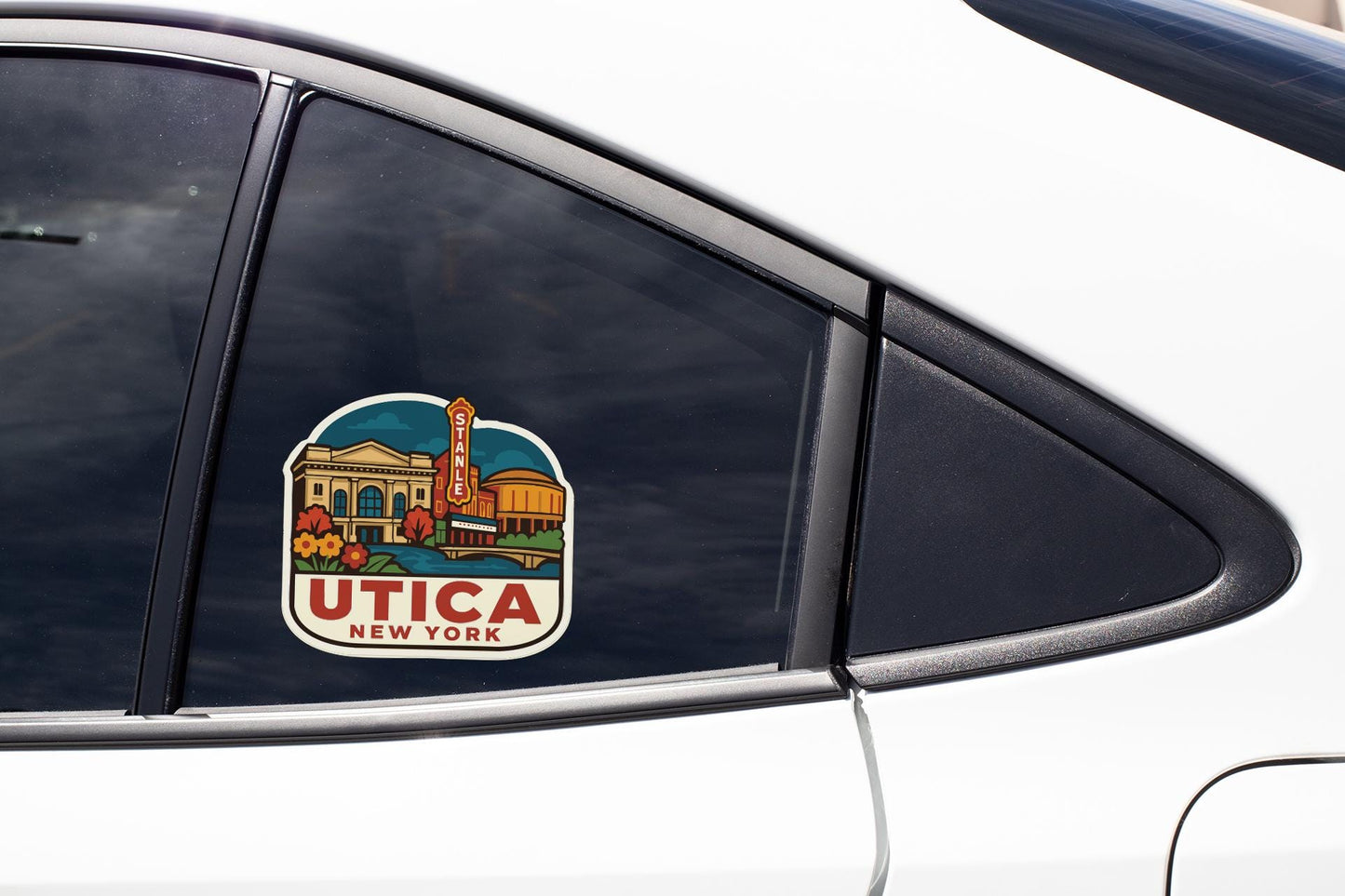 A sticker on the side of a car window that says "UTICA NEW YORK".