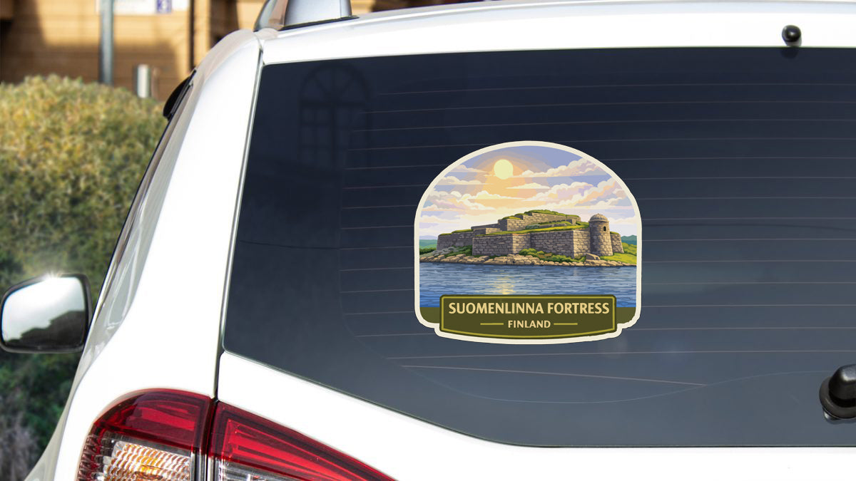A sticker on the rear window of a car depicting the Suomenlinna Fortress in Finland.