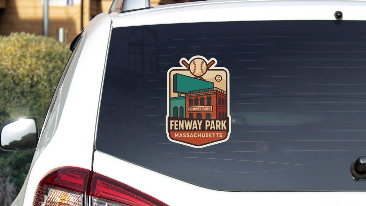 a sticker on the rear window of a vehicle, depicting Fenway Park in Massachusetts.