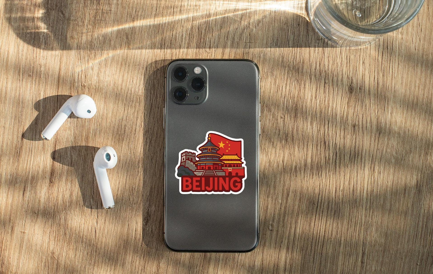 a cell phone sitting on top of a wooden table