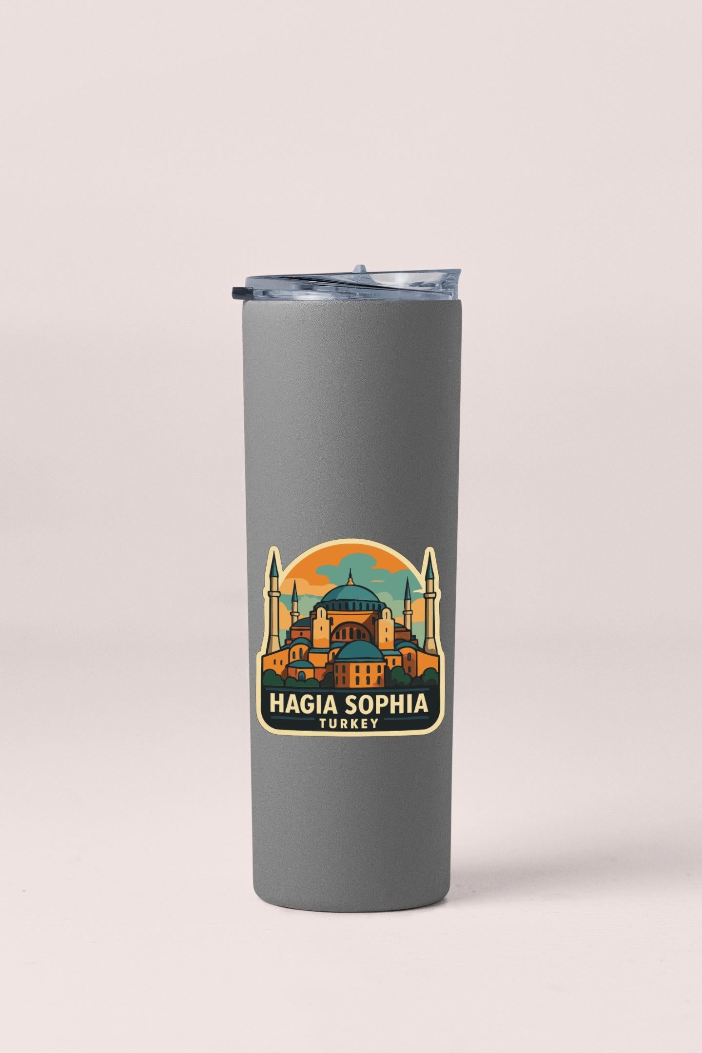 A gray insulated tumbler with a sticker featuring the Hagia Sophia, a famous landmark in Istanbul, Turkey.